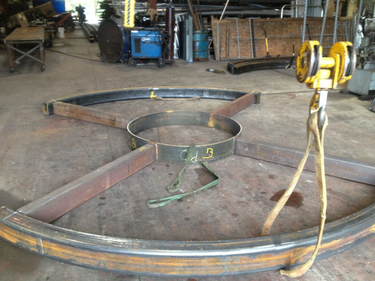 A curved steel frame being built on our shop floor